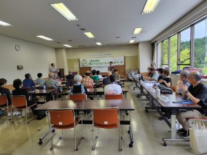 旭ケ丘市民センターでの総会の様子